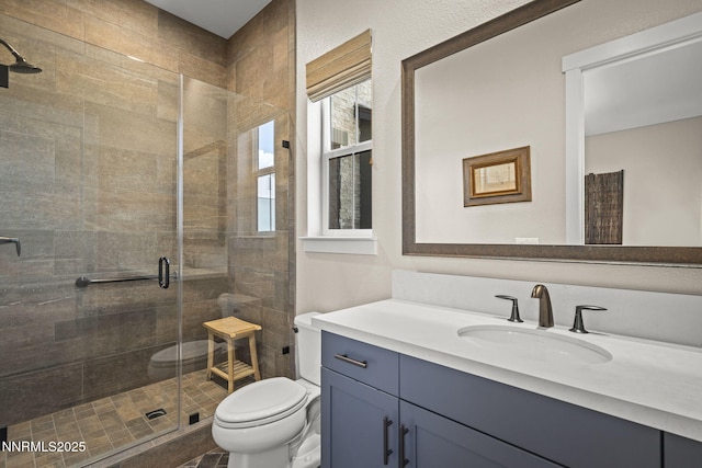6122 S Pleasant Oak Trl, Reno, NV 89511 - bathroom featuring a shower stall and vanity