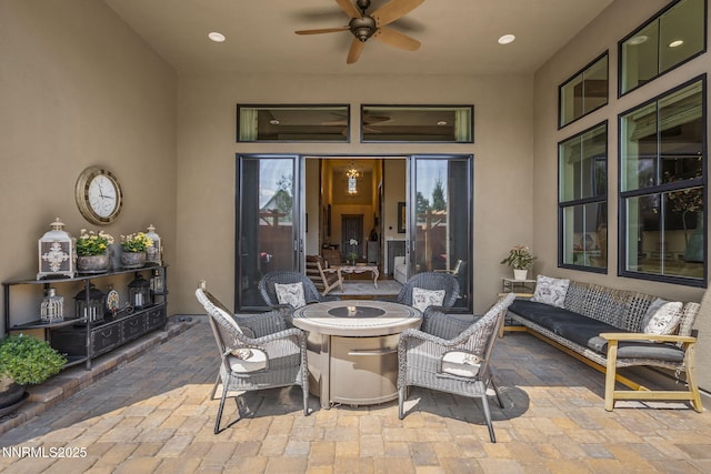 6122 S Pleasant Oak Trl, Reno, NV 89511 - view of patio with an outdoor fire pit and ceiling fan
