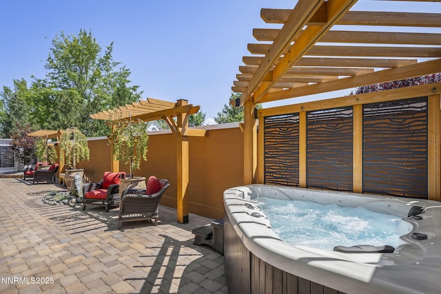 6122 S Pleasant Oak Trl, Reno, NV 89511 - view of patio / terrace with a hot tub and a pergola