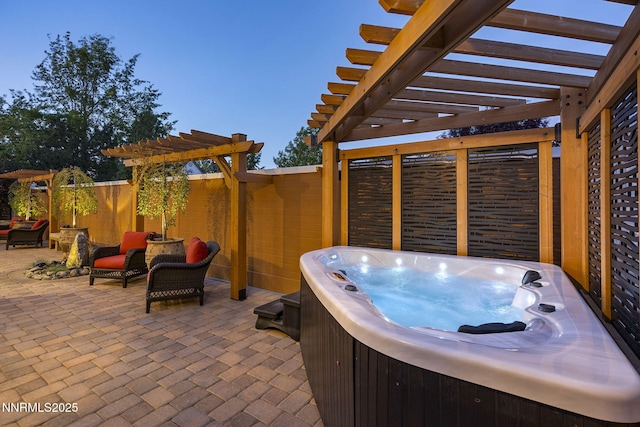 6122 S Pleasant Oak Trl, Reno, NV 89511 - view of patio with a hot tub and a pergola