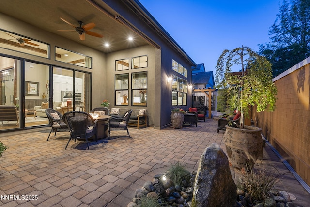 6122 S Pleasant Oak Trl, Reno, NV 89511 - fenced backyard featuring a patio area and a ceiling fan