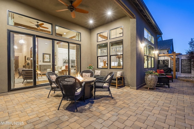 6122 S Pleasant Oak Trl, Reno, NV 89511 - view of patio / terrace with a fire pit and ceiling fan