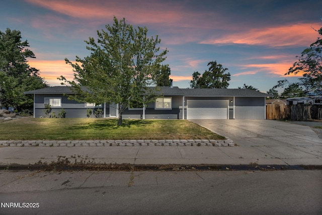 1419 Leonard Rd, Gardnerville, NV 89460 - view of front of house featuring concrete driveway and an attached garage