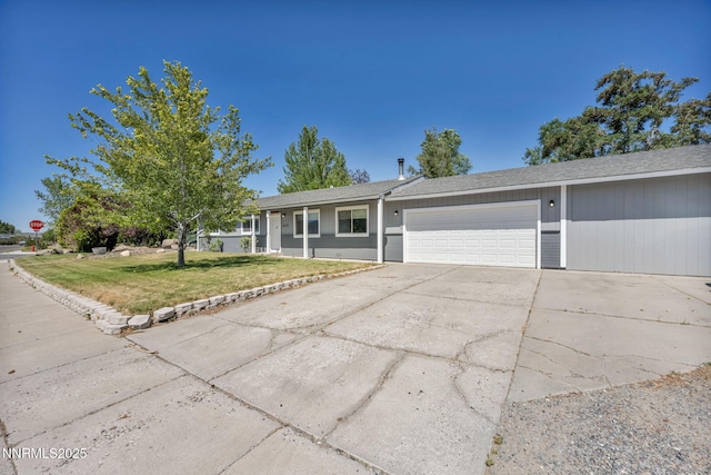 1419 Leonard Rd, Gardnerville, NV 89460 - ranch-style house with an attached garage, a front yard, and concrete driveway