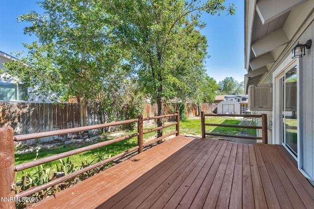1419 Leonard Rd, Gardnerville, NV 89460 - wooden deck with a shed and a fenced backyard