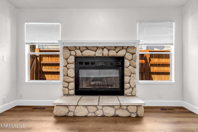 2240 Silver Ridge Dr, Reno, NV 89509 - detailed view of wood finished floors and a stone fireplace