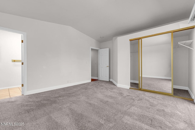 2240 Silver Ridge Dr, Reno, NV 89509 - unfurnished bedroom featuring carpet floors, vaulted ceiling, and a closet