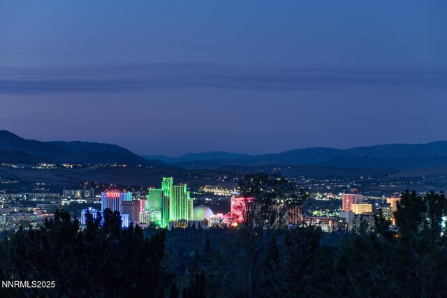 2240 Silver Ridge Dr, Reno, NV 89509 - view of city featuring a mountainous background and a view of city lights
