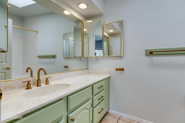 2240 Silver Ridge Dr, Reno, NV 89509 - full bathroom with a skylight, tile patterned flooring, vanity, and recessed lighting