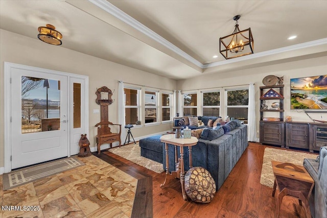 1962 Comstock Dr, Gardnerville, NV 89410 - living room with a chandelier, ornamental molding, recessed lighting, wood finished floors, and a raised ceiling