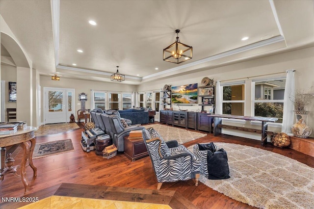 1962 Comstock Dr, Gardnerville, NV 89410 - living room with a tray ceiling, plenty of natural light, arched walkways, a chandelier, and recessed lighting