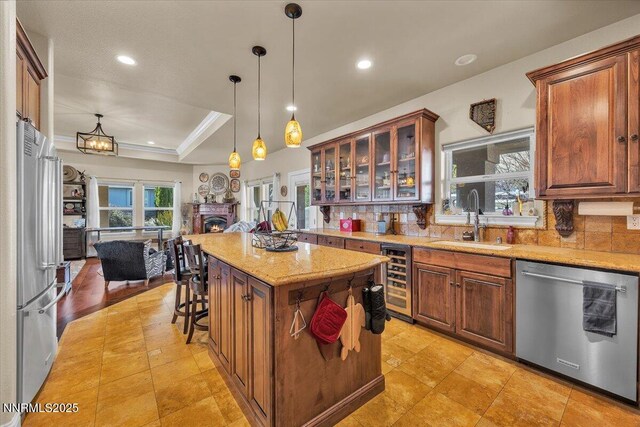 1962 Comstock Dr, Gardnerville, NV 89410 - kitchen featuring stainless steel appliances, wine cooler, open floor plan, recessed lighting, and backsplash