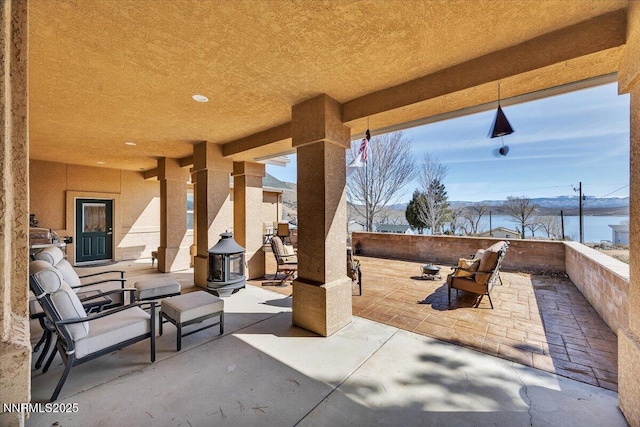 1962 Comstock Dr, Gardnerville, NV 89410 - view of patio / terrace with an outdoor fire pit
