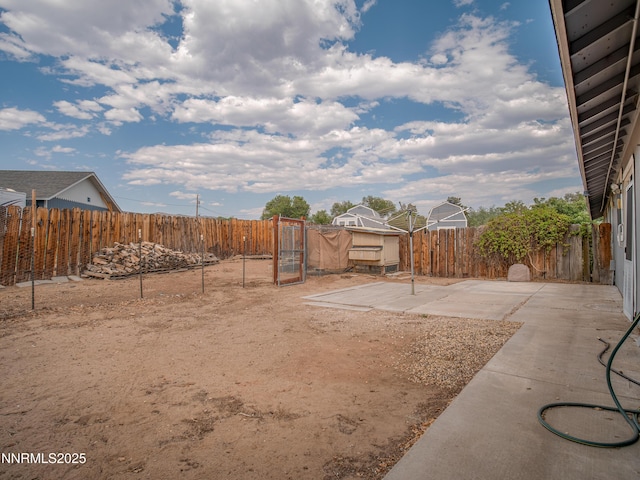 2843 Wade St, Minden, NV 89423 - fenced backyard featuring a patio area