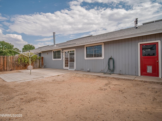 2843 Wade St, Minden, NV 89423 - back of property featuring a patio and a shingled roof