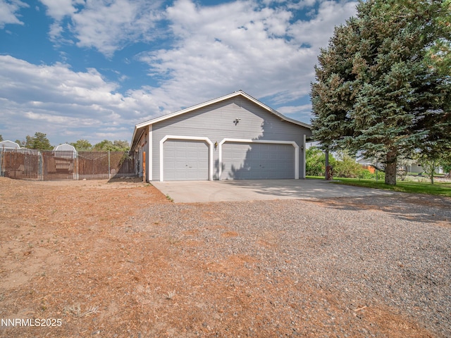 2843 Wade St, Minden, NV 89423 - garage with gravel driveway