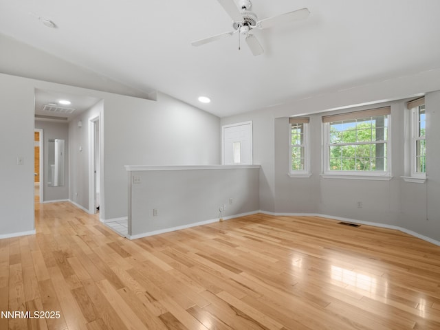2843 Wade St, Minden, NV 89423 - spare room with wood finished floors, vaulted ceiling, a ceiling fan, and recessed lighting