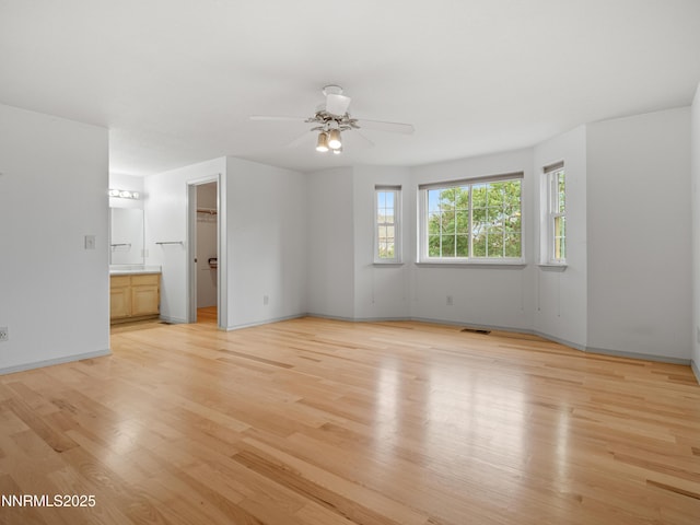 2843 Wade St, Minden, NV 89423 - spare room with light wood-style floors and a ceiling fan