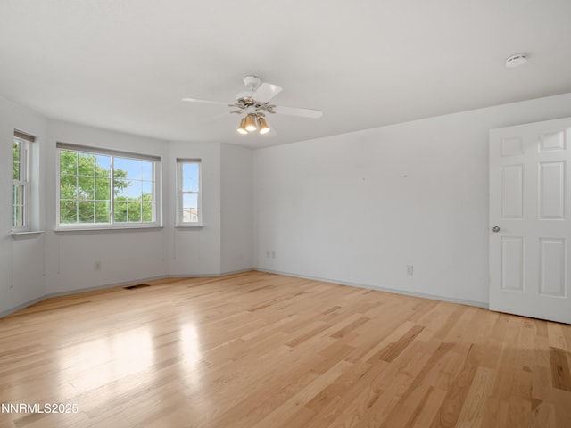2843 Wade St, Minden, NV 89423 - unfurnished room with a smoke detector, light wood-style flooring, and ceiling fan