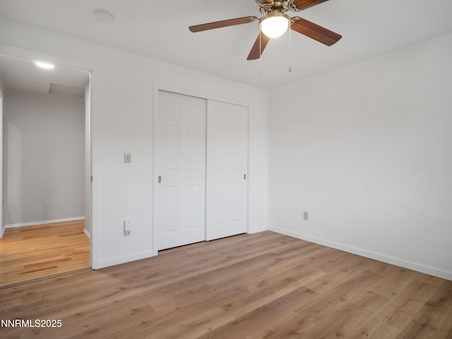 2843 Wade St, Minden, NV 89423 - unfurnished bedroom featuring light wood-style flooring, a closet, and ceiling fan