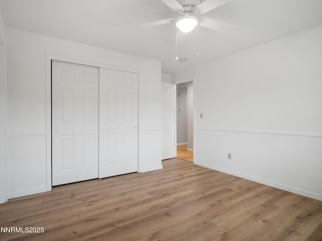 2843 Wade St, Minden, NV 89423 - unfurnished bedroom with wood finished floors, a closet, and ceiling fan