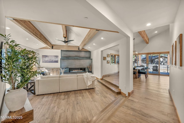 116 Cypress Way, Stateline, NV 89449 - living room with recessed lighting, a glass covered fireplace, and light wood-style floors