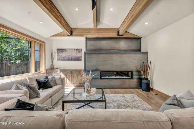 116 Cypress Way, Stateline, NV 89449 - living area featuring wood finished floors, a glass covered fireplace, and recessed lighting
