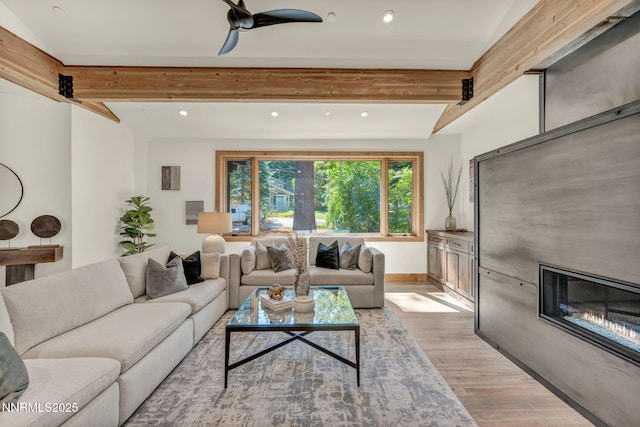 116 Cypress Way, Stateline, NV 89449 - living room featuring a fireplace, beam ceiling, light wood-style floors, recessed lighting, and a ceiling fan