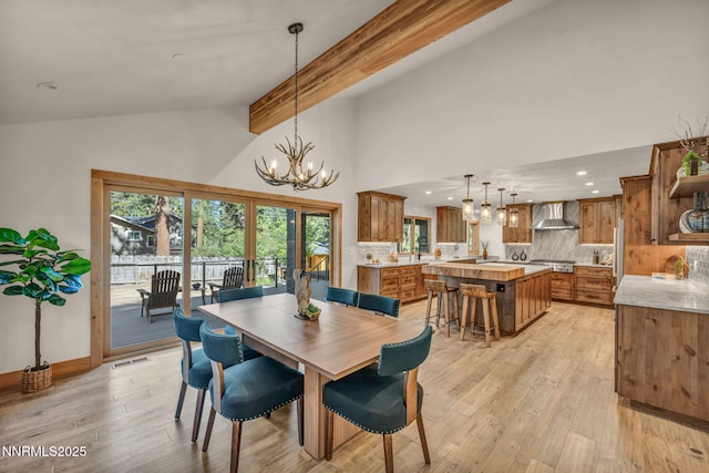 116 Cypress Way, Stateline, NV 89449 - dining room with a chandelier, light wood-type flooring, high vaulted ceiling, recessed lighting, and beamed ceiling
