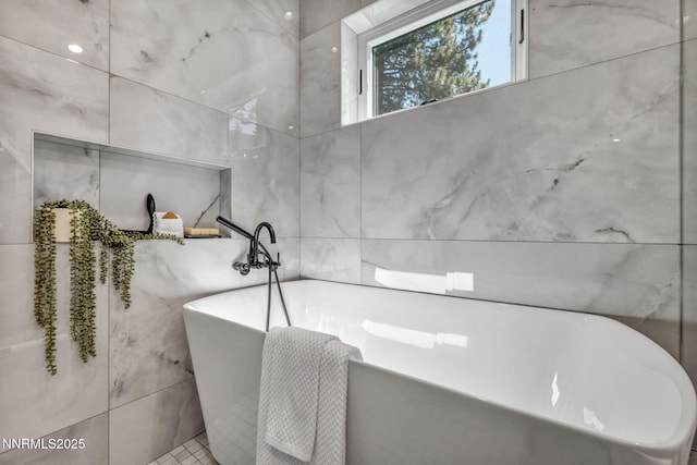 116 Cypress Way, Stateline, NV 89449 - bathroom with a soaking tub and tile walls