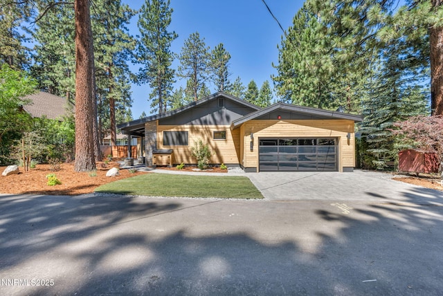 116 Cypress Way, Stateline, NV 89449 - view of front of home with driveway, an attached garage, and a front yard