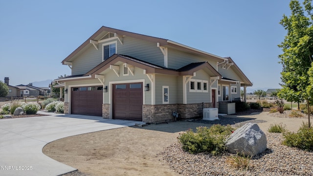 1725 Grandview Pkwy, Minden, NV 89423 - craftsman-style house featuring concrete driveway and stone siding