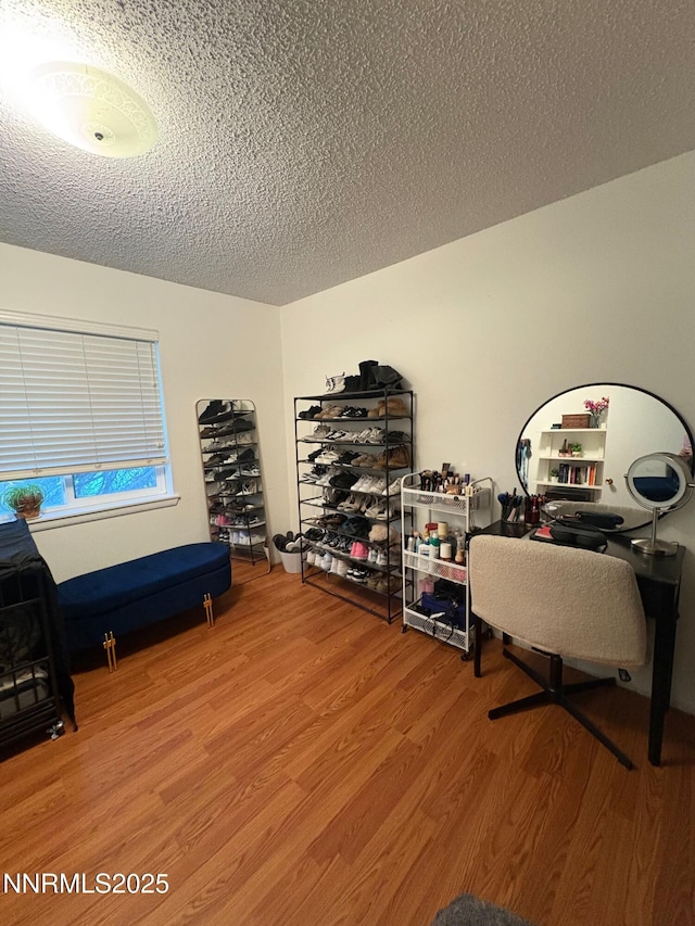 5045 Offenhauser Dr, Winnemucca, NV 89445 - office area with wood finished floors and a textured ceiling