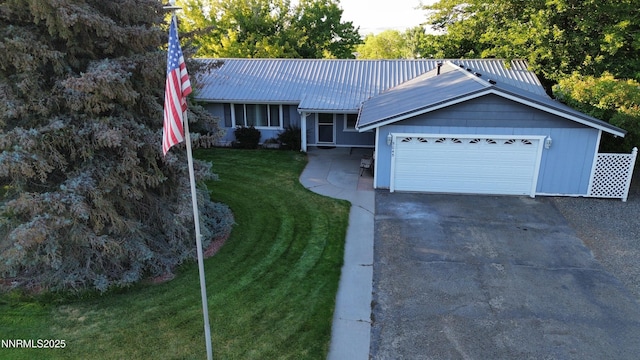 5045 Offenhauser Dr, Winnemucca, NV 89445 - single story home with concrete driveway, a garage, a front yard, and a metal roof