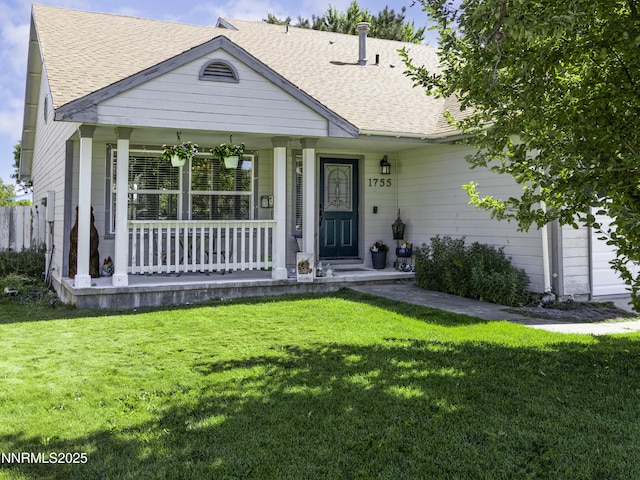 1755 Mizpah St, Winnemucca, NV 89445 - view of front of house featuring covered porch, a front yard, and roof with shingles