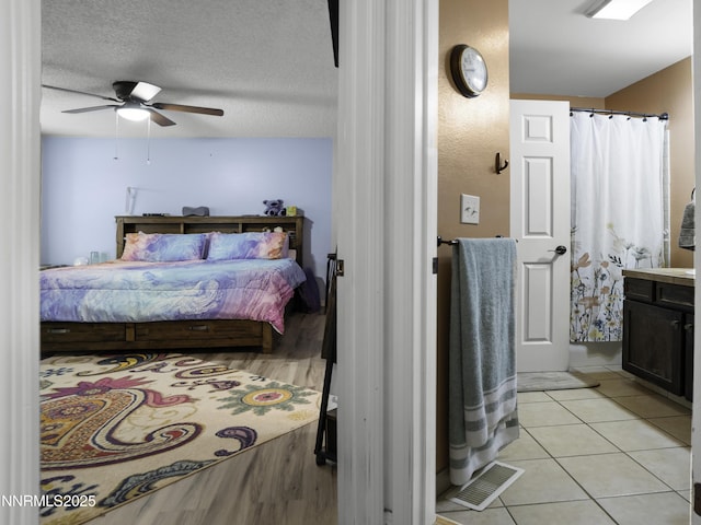 1755 Mizpah St, Winnemucca, NV 89445 - bedroom with light tile patterned flooring and ceiling fan