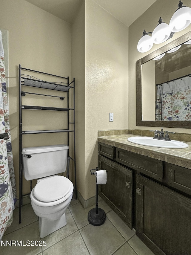 1755 Mizpah St, Winnemucca, NV 89445 - full bathroom featuring vanity and tile patterned flooring