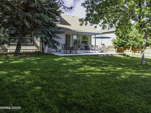 1755 Mizpah St, Winnemucca, NV 89445 - back of house with a patio area