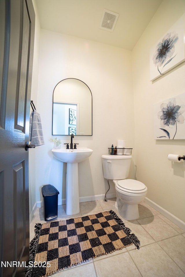 2691 Sutter Butte Ct, Sparks, NV 89436 - half bathroom featuring toilet and tile patterned flooring