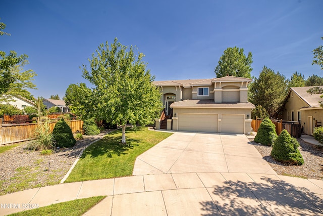 2691 Sutter Butte Ct, Sparks, NV 89436 - view of front facade featuring an attached garage, driveway, and stucco siding
