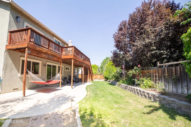 2691 Sutter Butte Ct, Sparks, NV 89436 - fenced backyard with a wooden deck and a patio