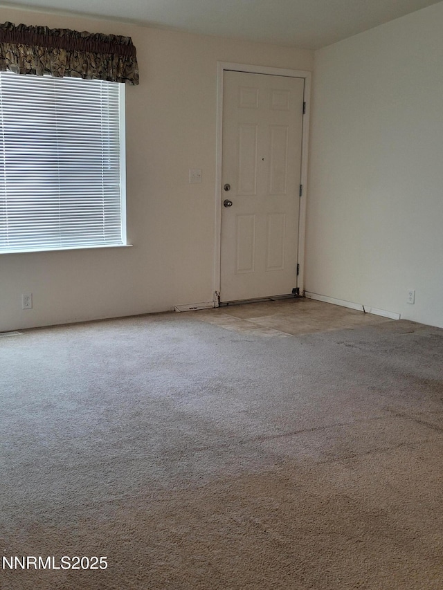3340 Moon Ln, Winnemucca, NV 89445 - spare room featuring carpet flooring
