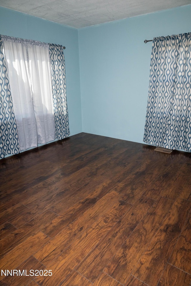 406 W 5th St, Winnemucca, NV 89445 - unfurnished room featuring dark wood-style flooring