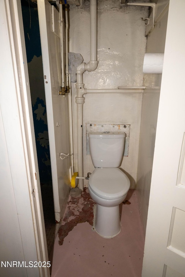 406 W 5th St, Winnemucca, NV 89445 - bathroom featuring toilet and concrete floors