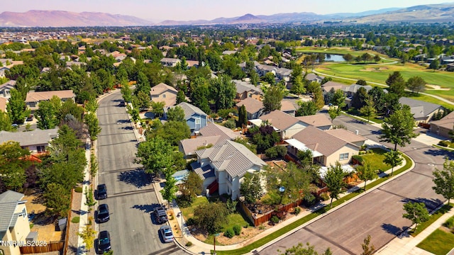 7302 Little Easy St, Sparks, NV 89436 - aerial perspective of suburban area with a water and mountain view and a golf course
