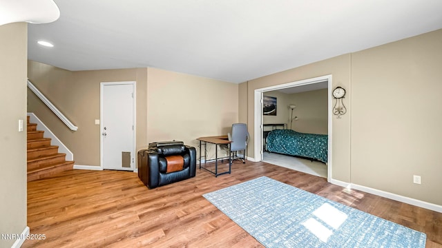 7302 Little Easy St, Sparks, NV 89436 - sitting room with wood finished floors, stairs, and recessed lighting