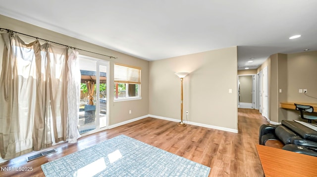 7302 Little Easy St, Sparks, NV 89436 - living area featuring wood finished floors and recessed lighting