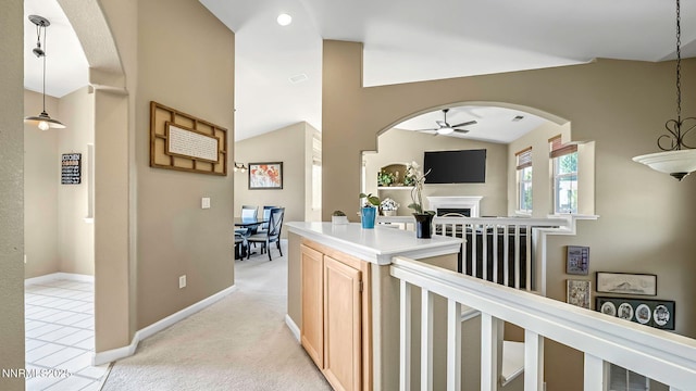 7302 Little Easy St, Sparks, NV 89436 - corridor with arched walkways, vaulted ceiling, and light colored carpet