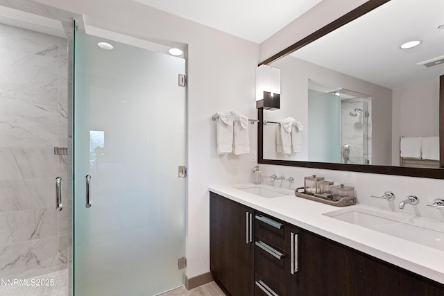 17 Beach Club Dr Unit 214, Stateline, NV 89449 - bathroom featuring double vanity and a stall shower