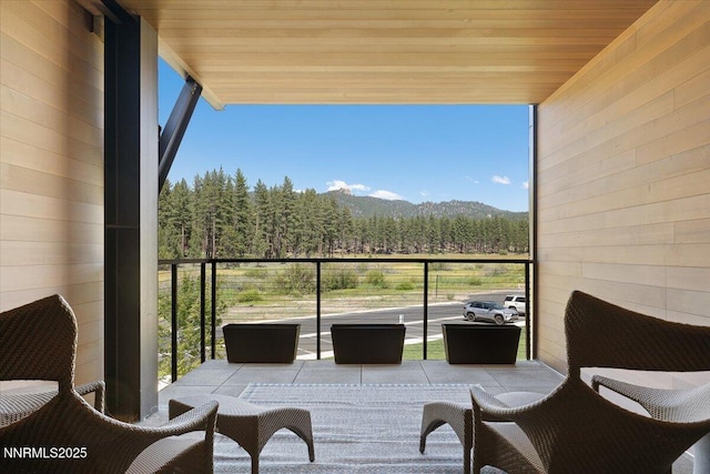 17 Beach Club Dr Unit 214, Stateline, NV 89449 - balcony featuring a view of trees and a sunroom